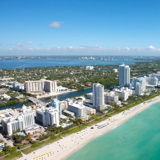 Aerial View of City Buildings Near Body of Water