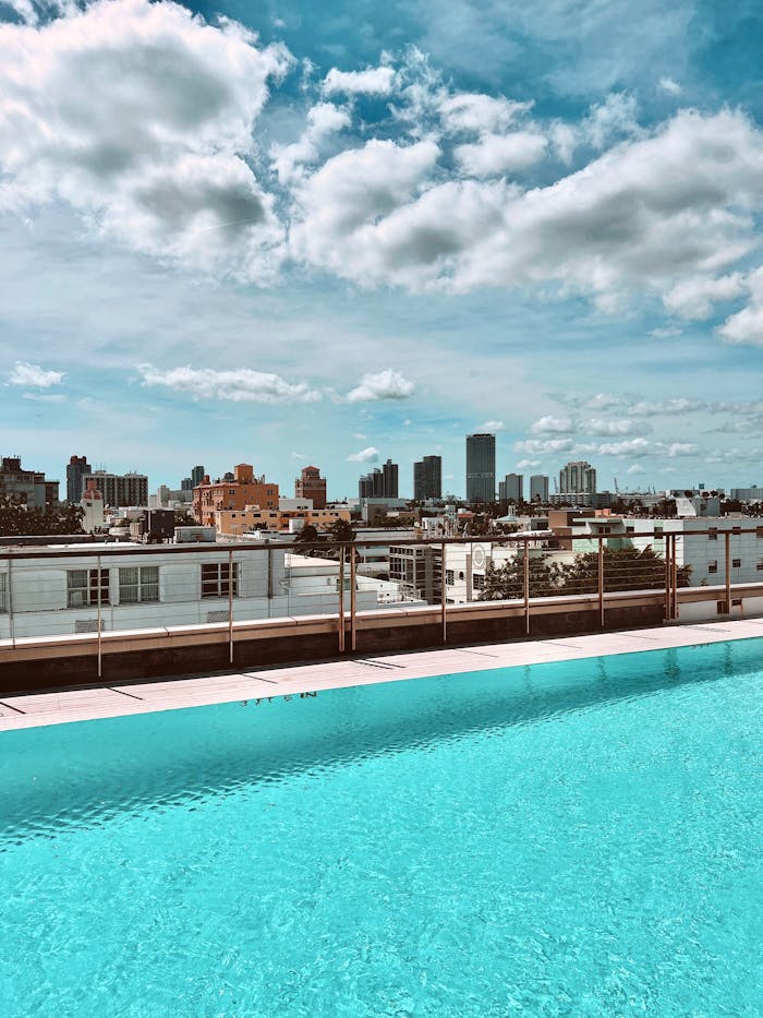 Rooftop Pool Overlooking Urban City Skyline